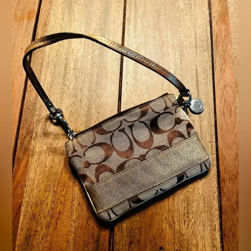 Coach Brown and Tan Signature Wristlet with gold stripe. Vintage 4x6 inches